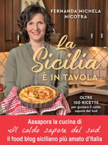 La Sicilia è in tavola. Oltre 100 ricette per gustare il caldo sapore del Sud - Fernanda Michela Nicotra